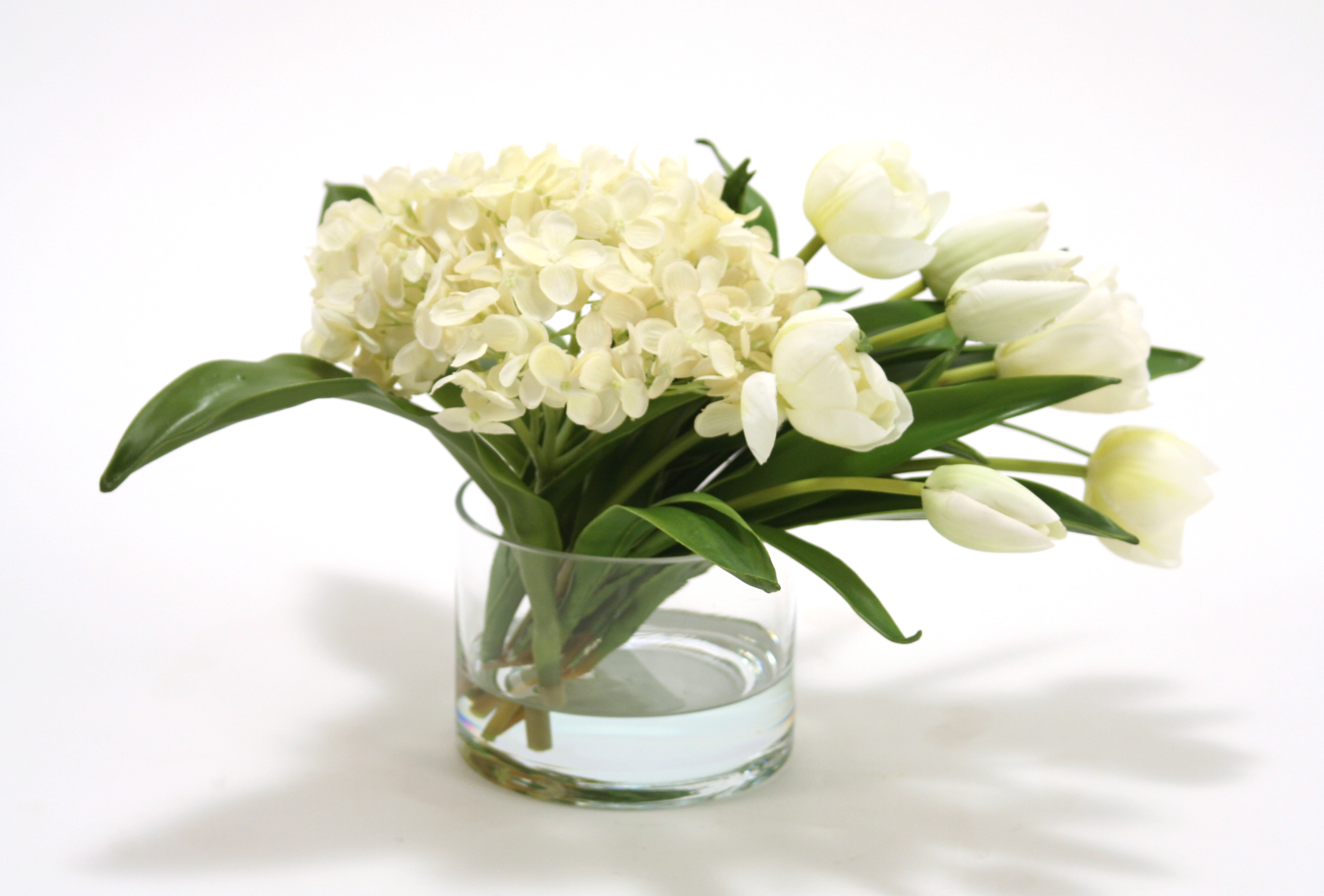 Waterlook ® Silk White Hydrangeas with White Stage Tulips in a Glass Cylinder