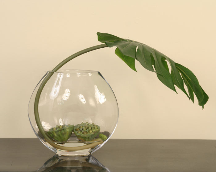 Artistic Waterlook ® Design Featuring Silk Philo Leaf with Lotus Pods in a Glass Disk Artistic Waterlook ® Design Featuring Silk Philo Leaf with Lotus Pods in a Glass Disk