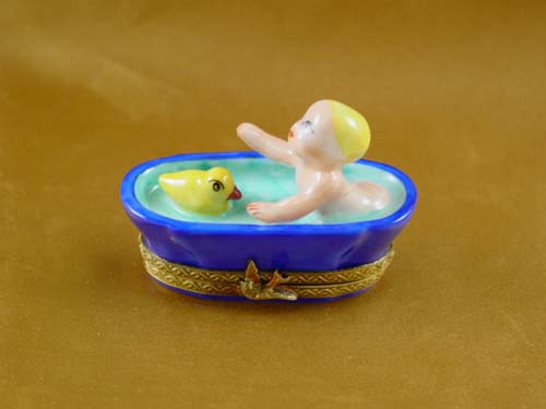 Baby in tub with duck