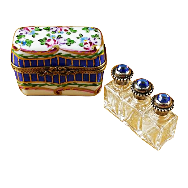 BLUE AND FLORAL CHEST WITH THREE BOTTLES