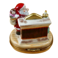 Santa w/gifts by fireplace