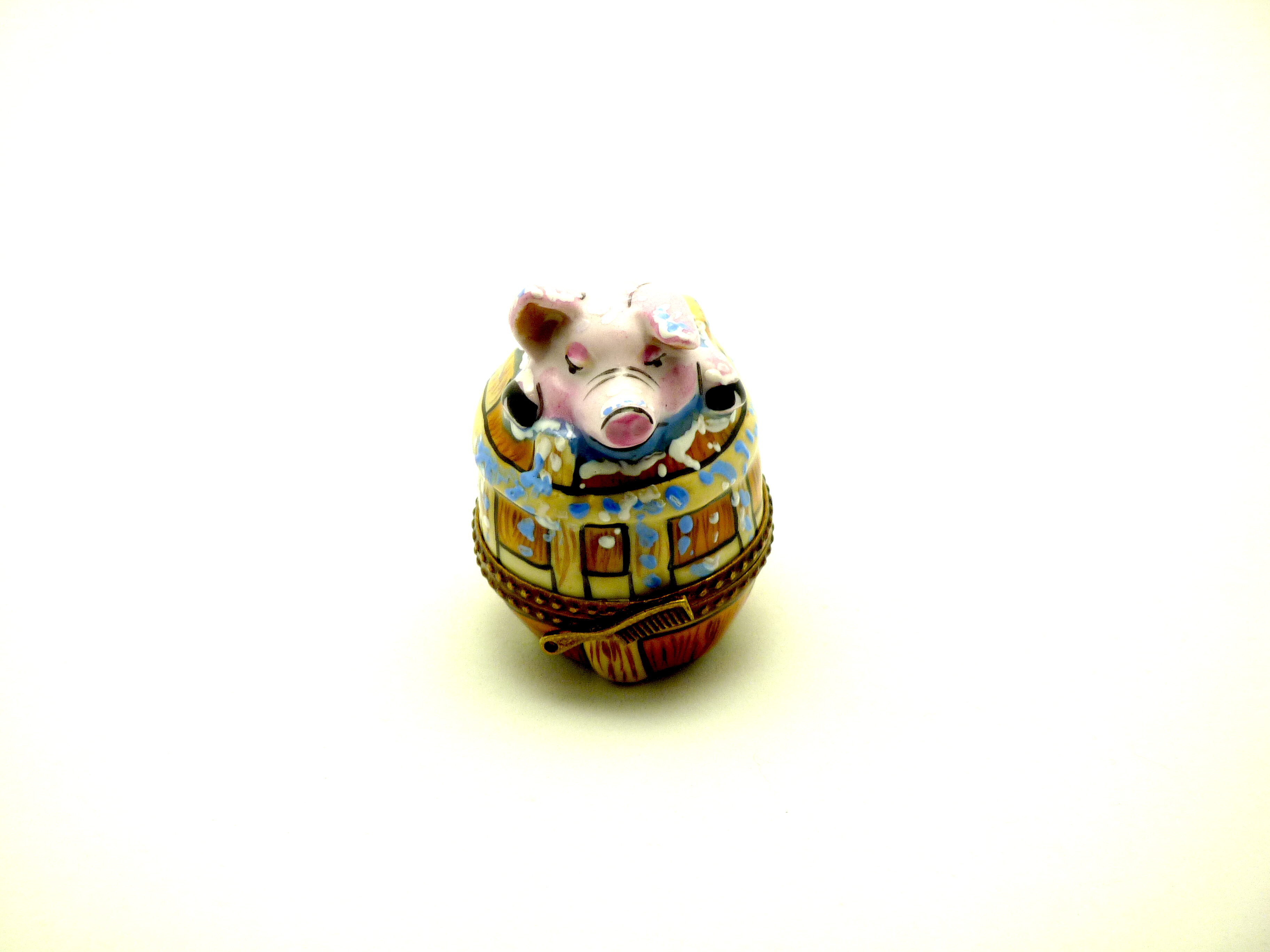 Pig bathing in harvest barrel