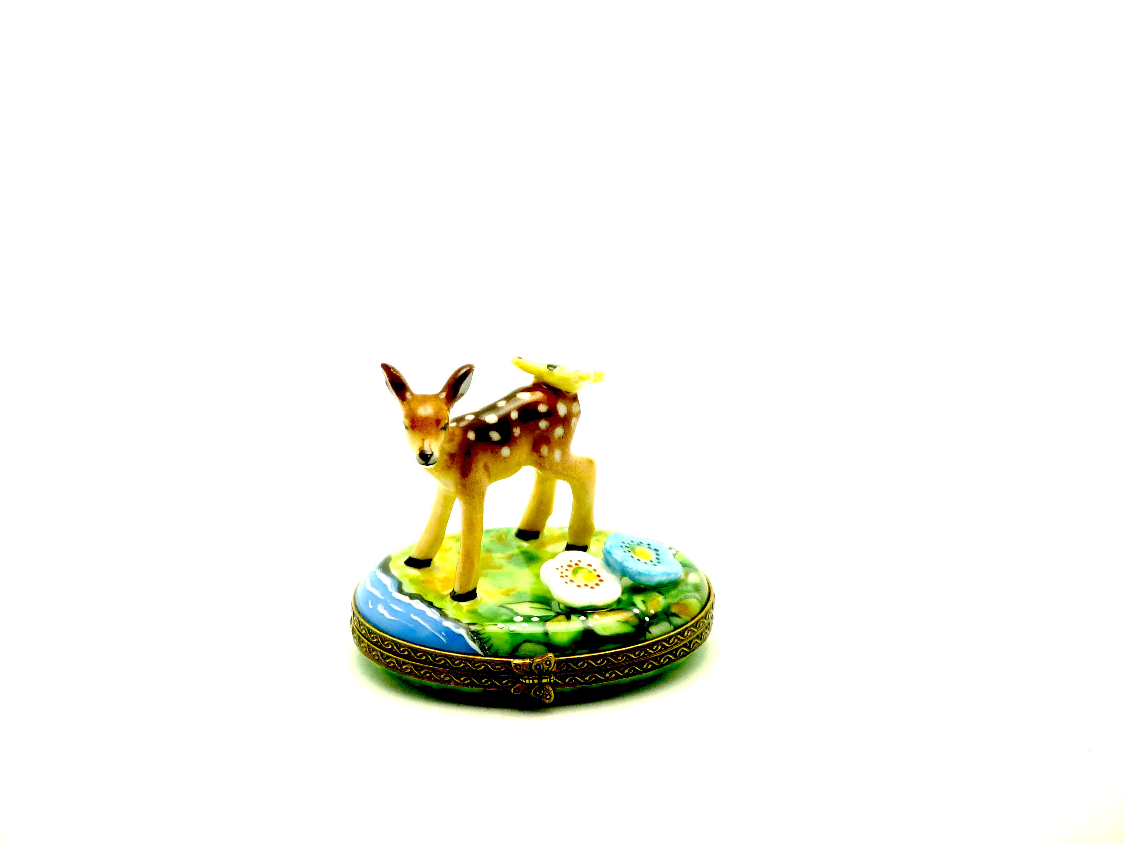 Baby deer with butterfly