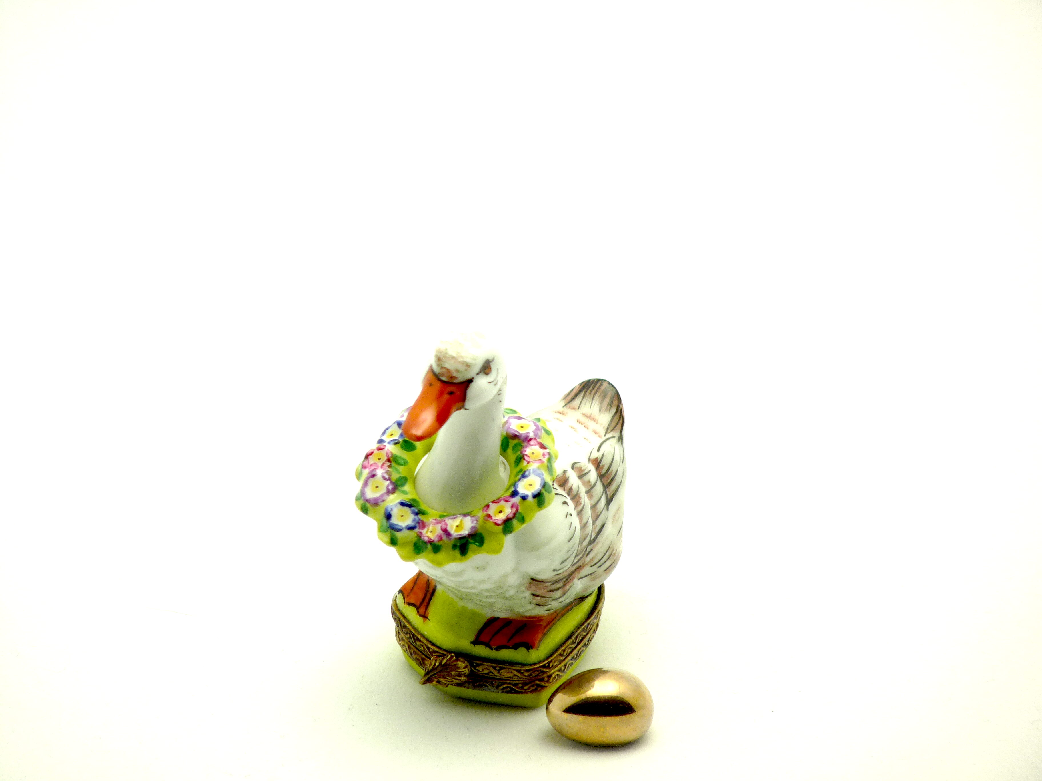 Goose with flower wreath and gold egg