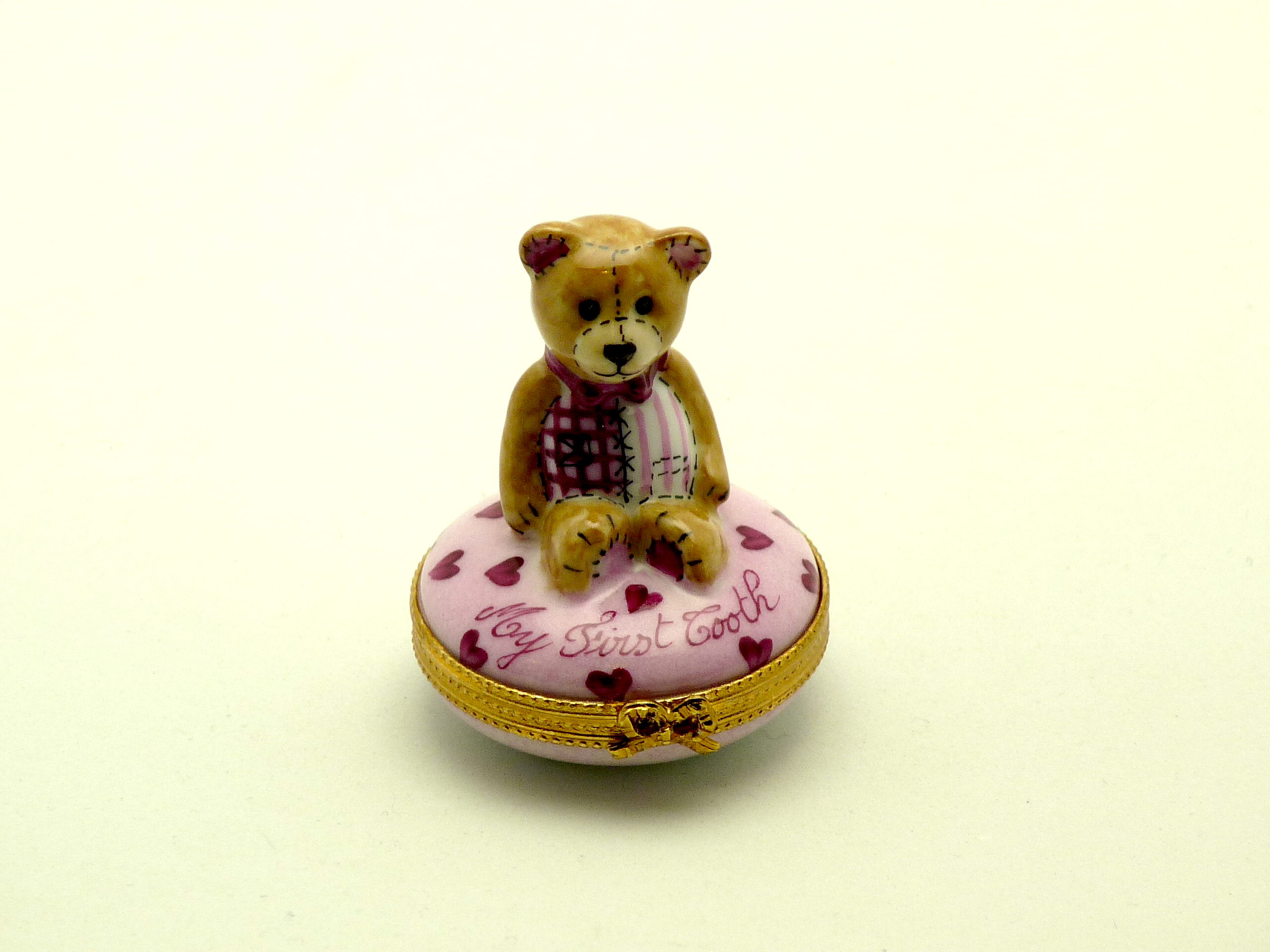 Teddy bear pink : my first tooth