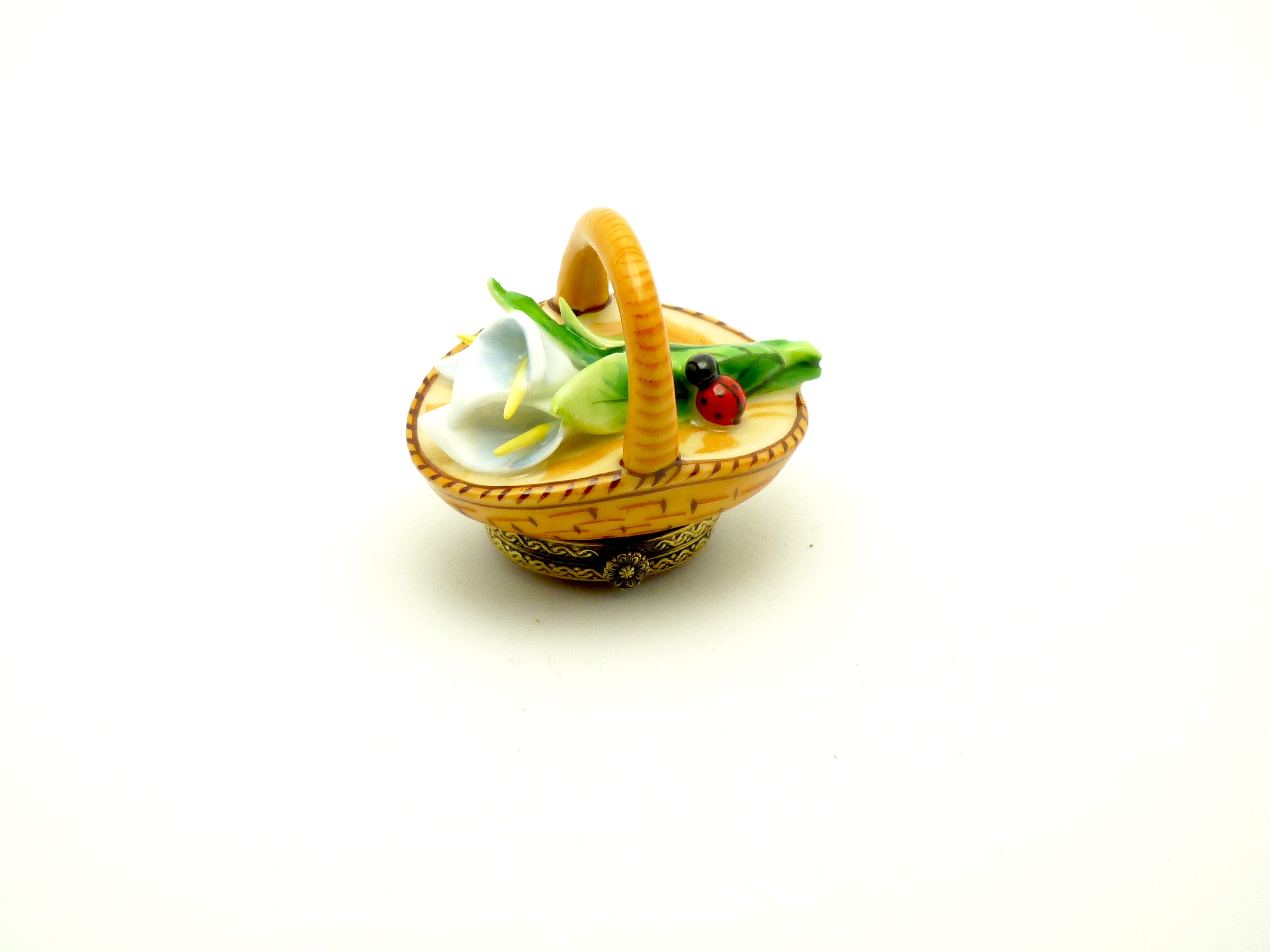 Basket with white lilies & lady bug