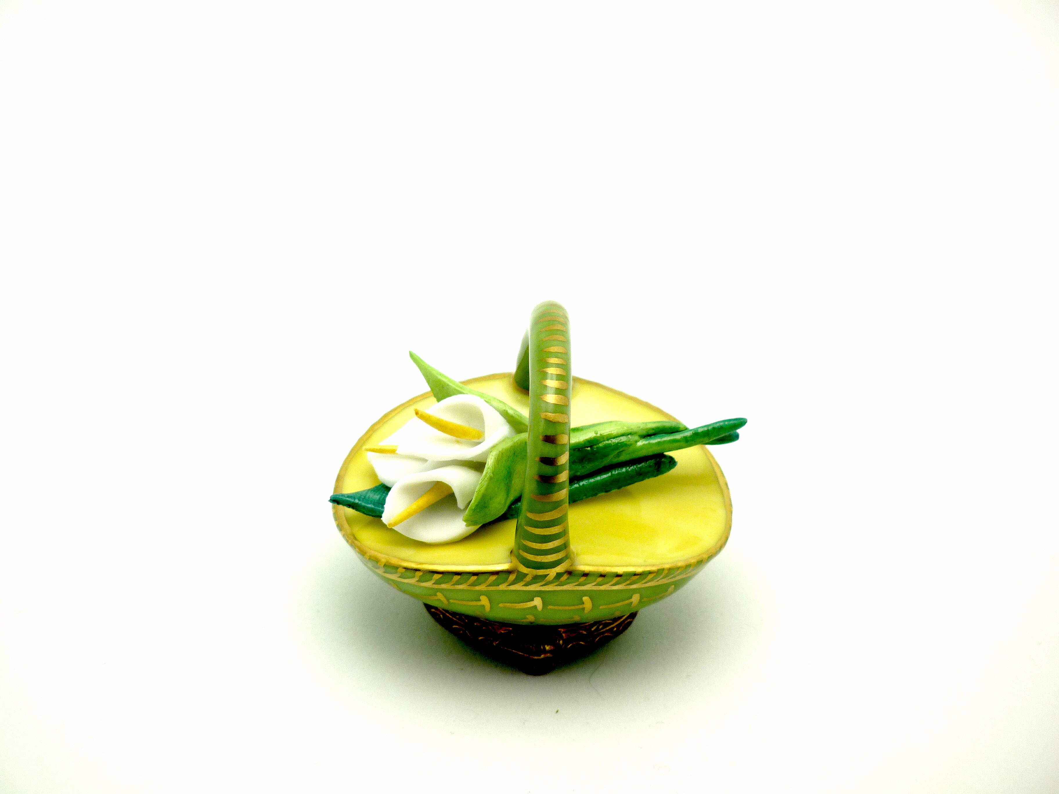 Basket with lilies green & gold