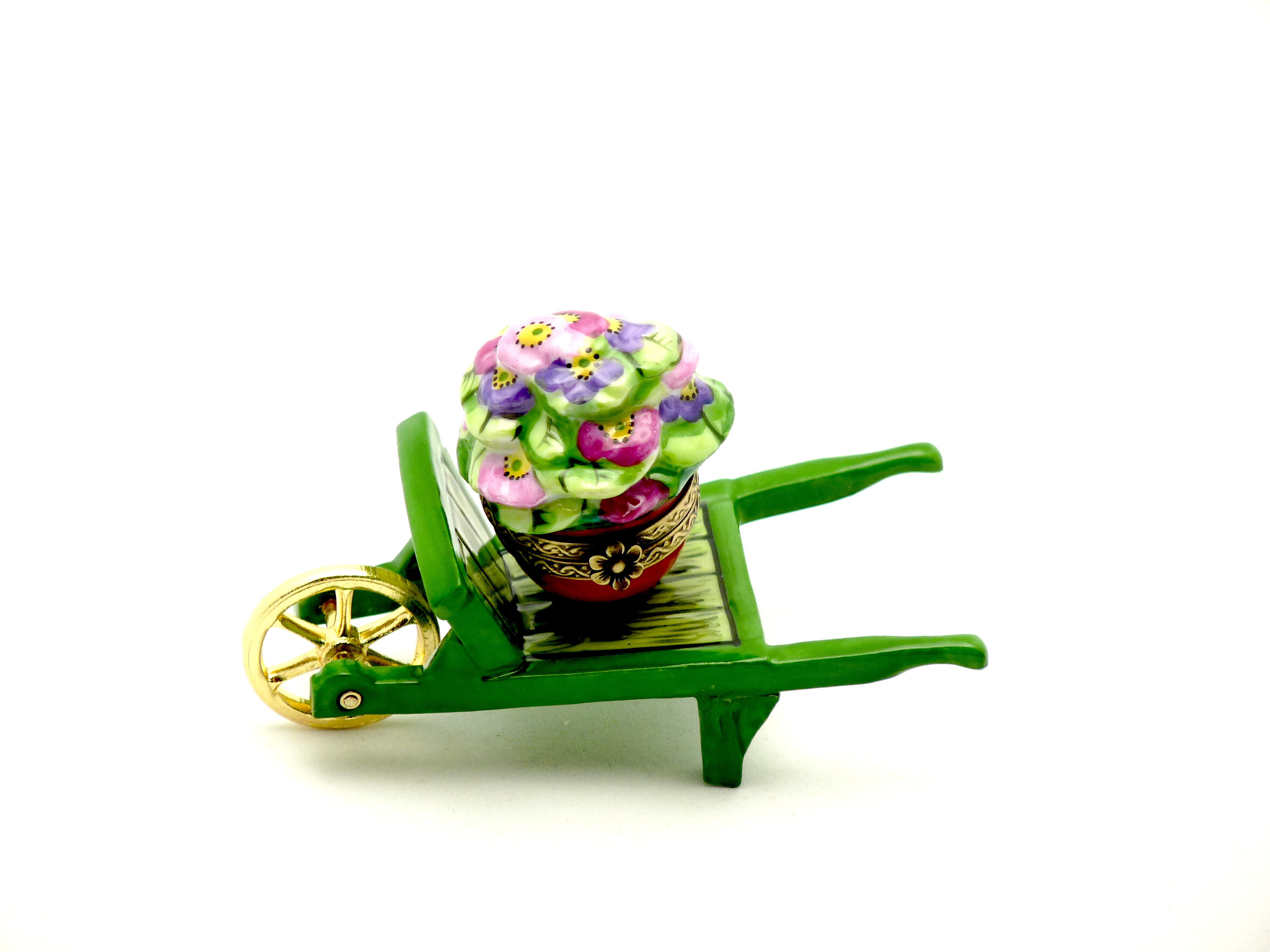 Wheelbarrow green with flower pot