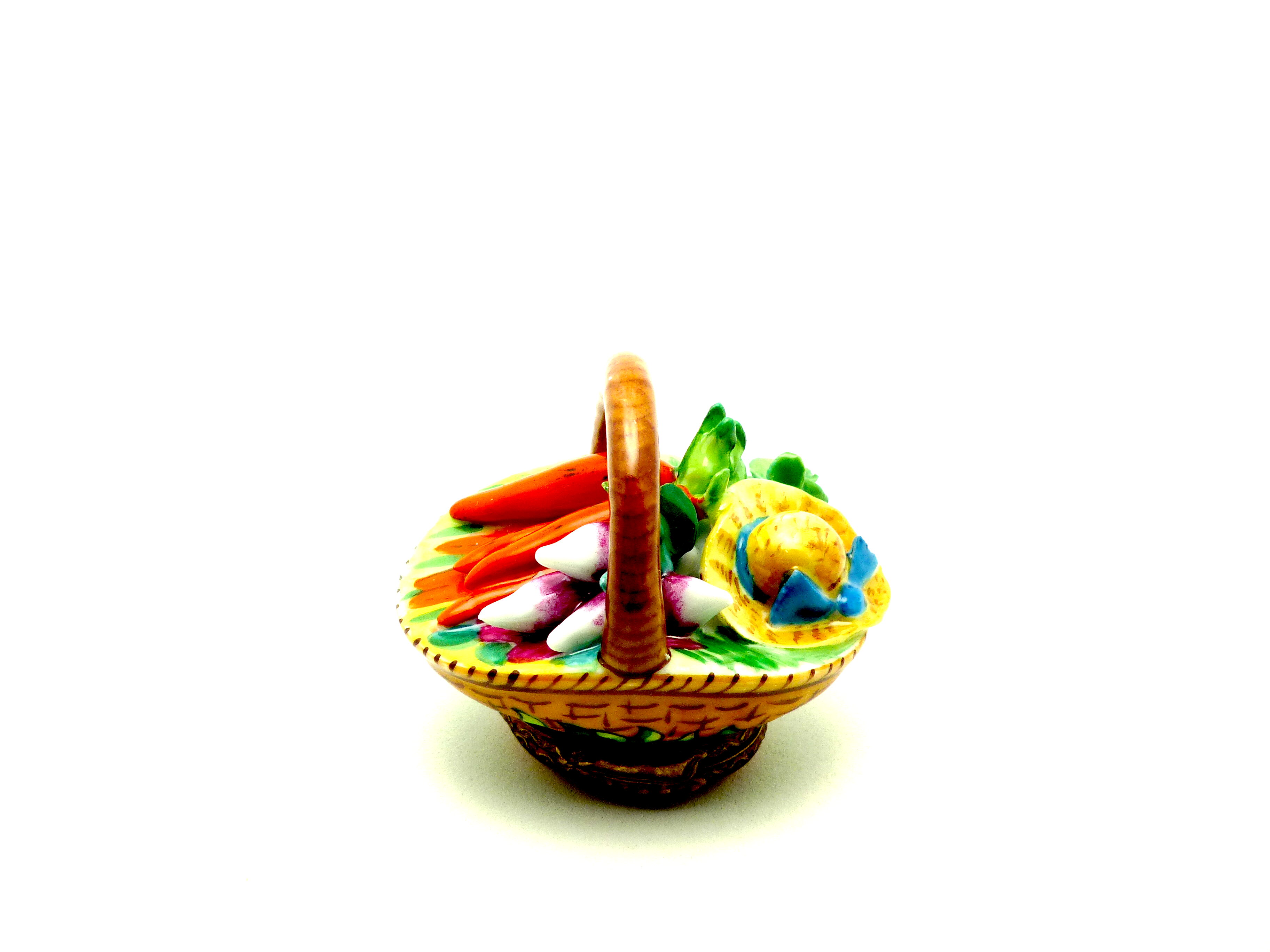 Basket with hat, radish & carrots