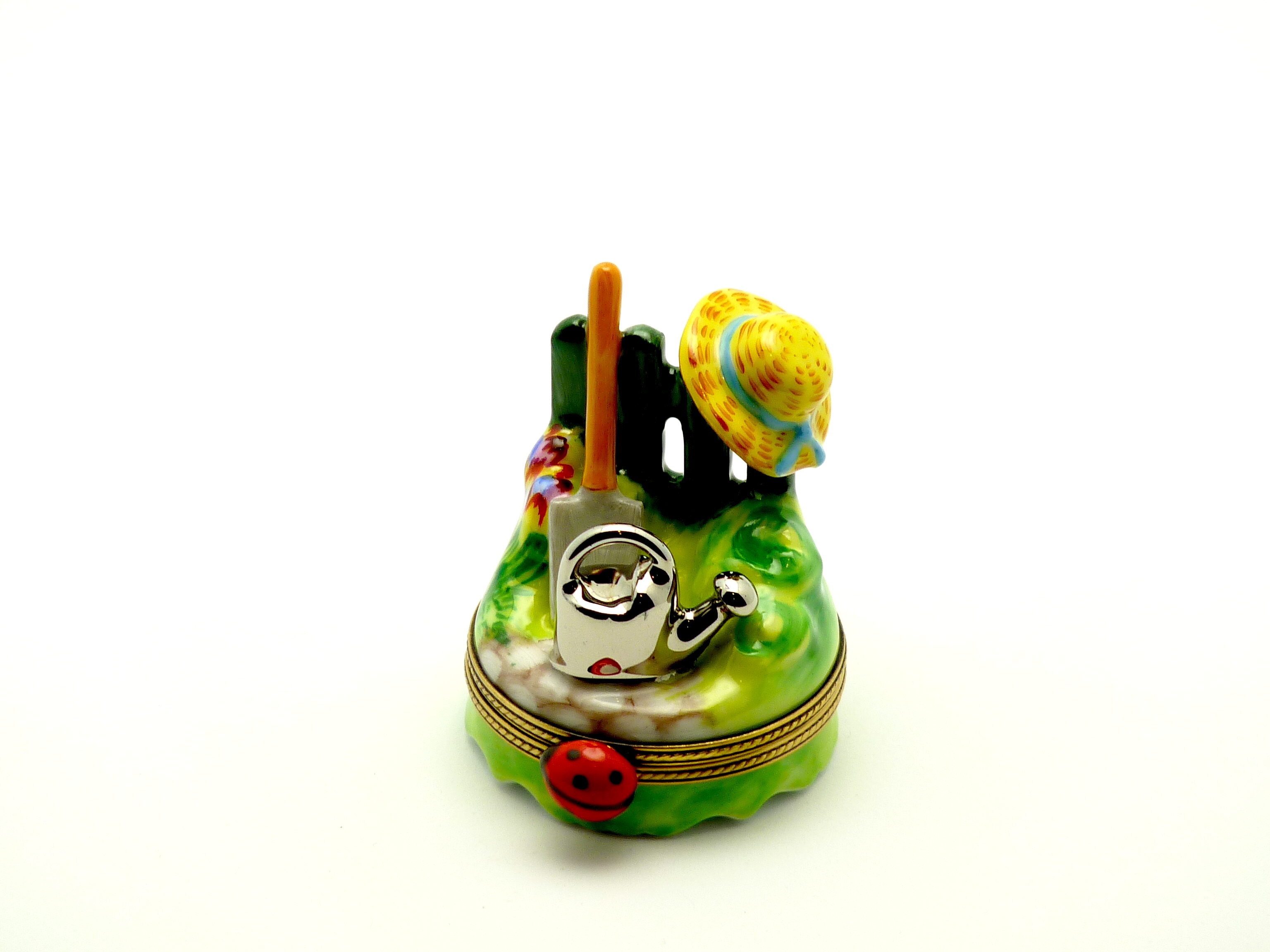 Garden scene with hat & watering can