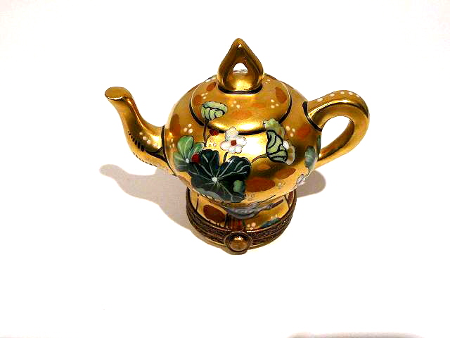 Teapot gold with flowers