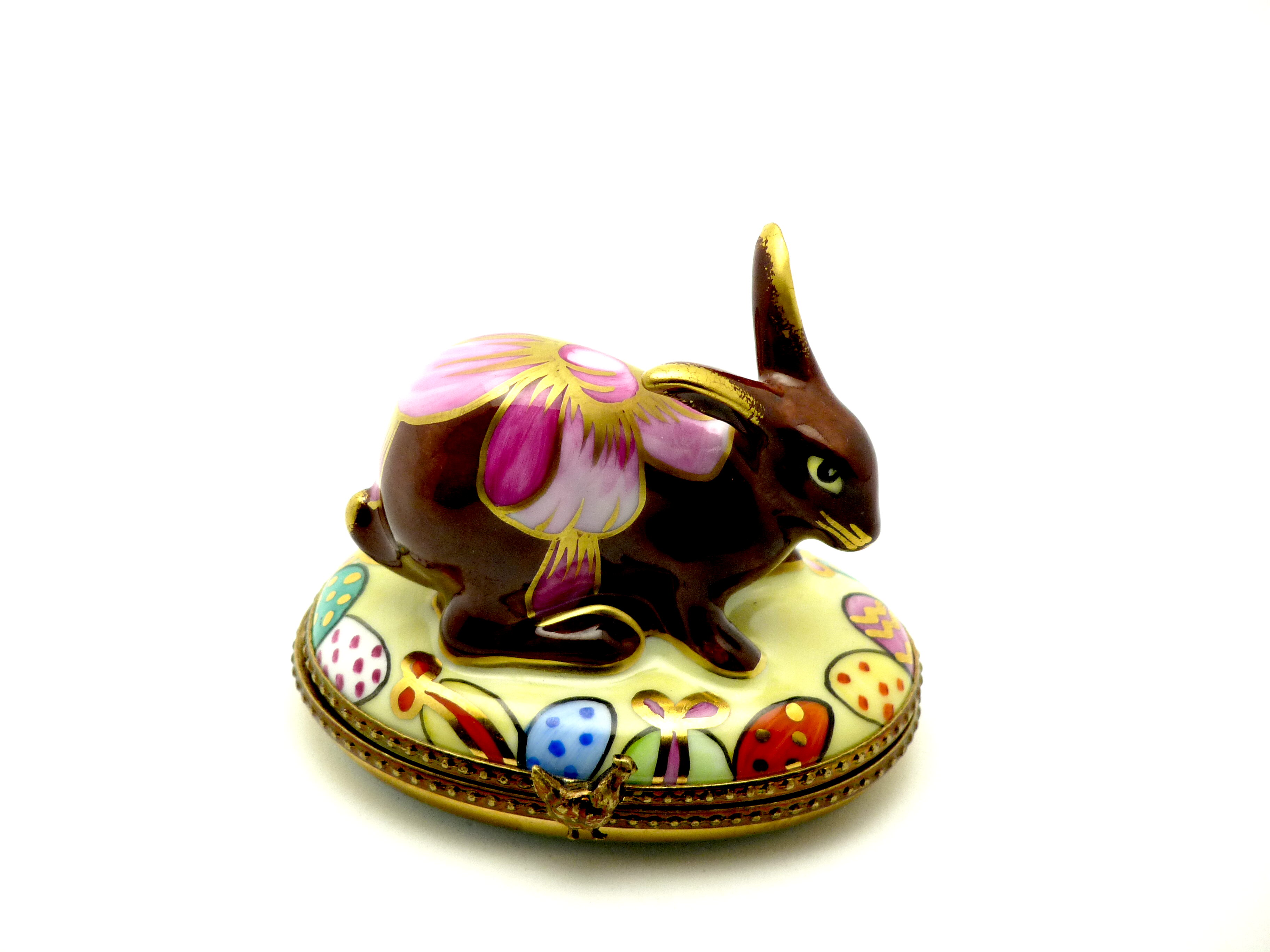 Easter rabbit chocolat with big bow & gold egg inside