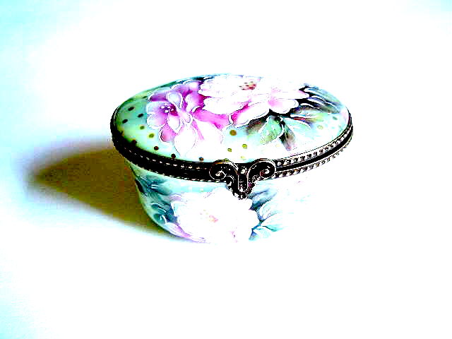 Oval box green flowers with boy & girl portrait inside..Limited edition to 250, signed & numbered