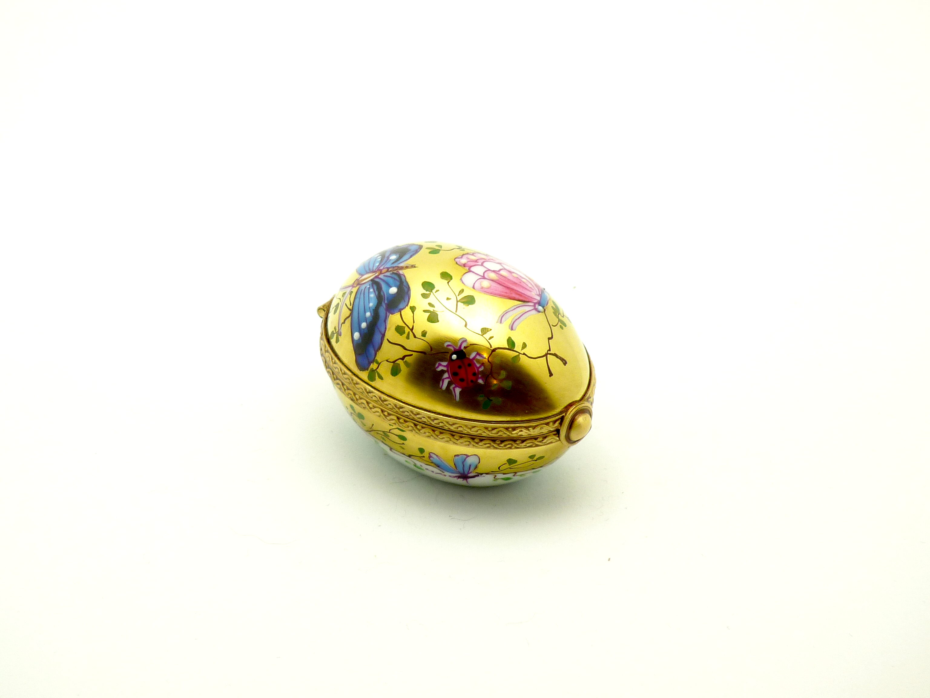 Egg gold with butterfly decors