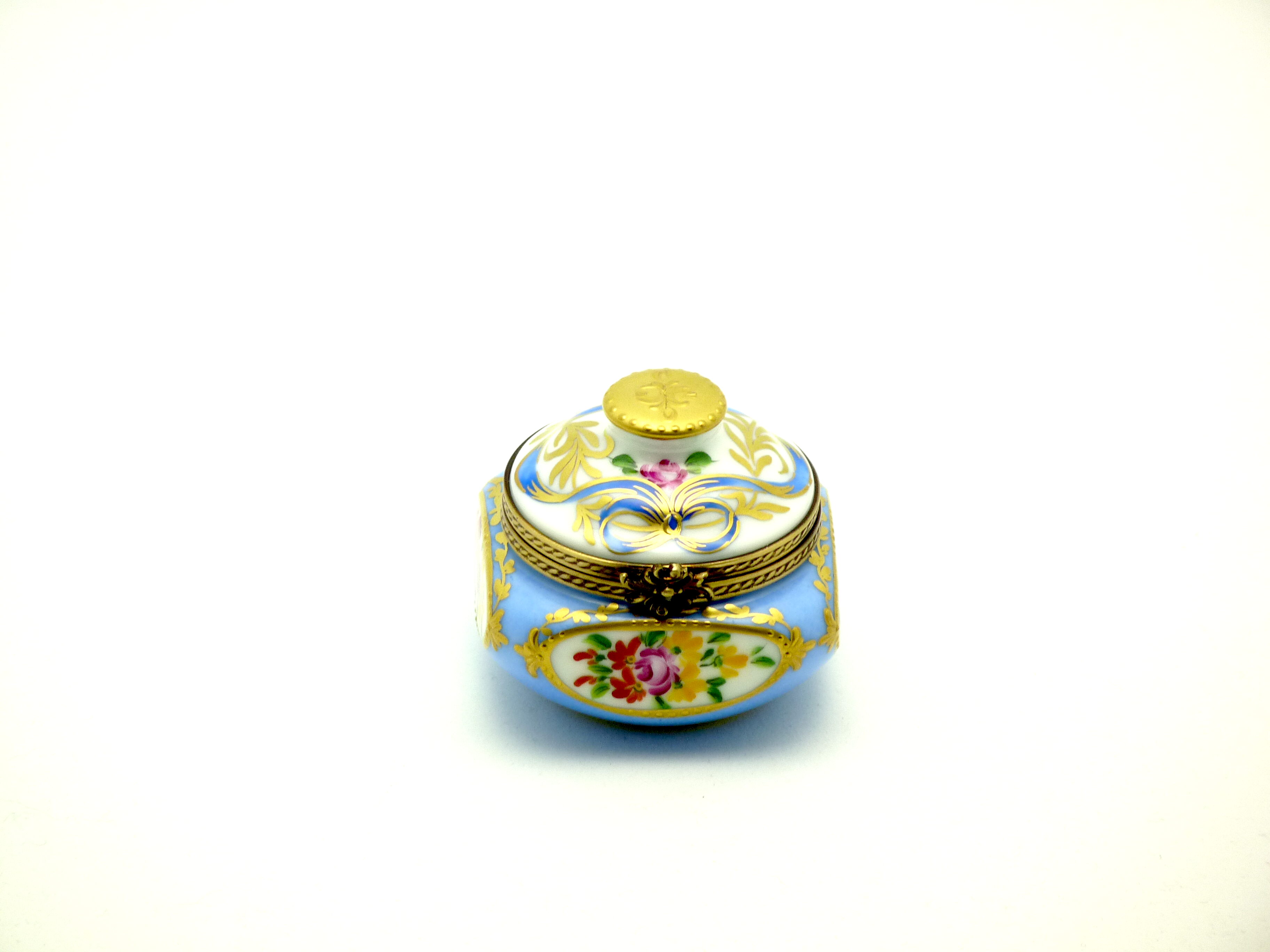 Small antique pot blue flowers