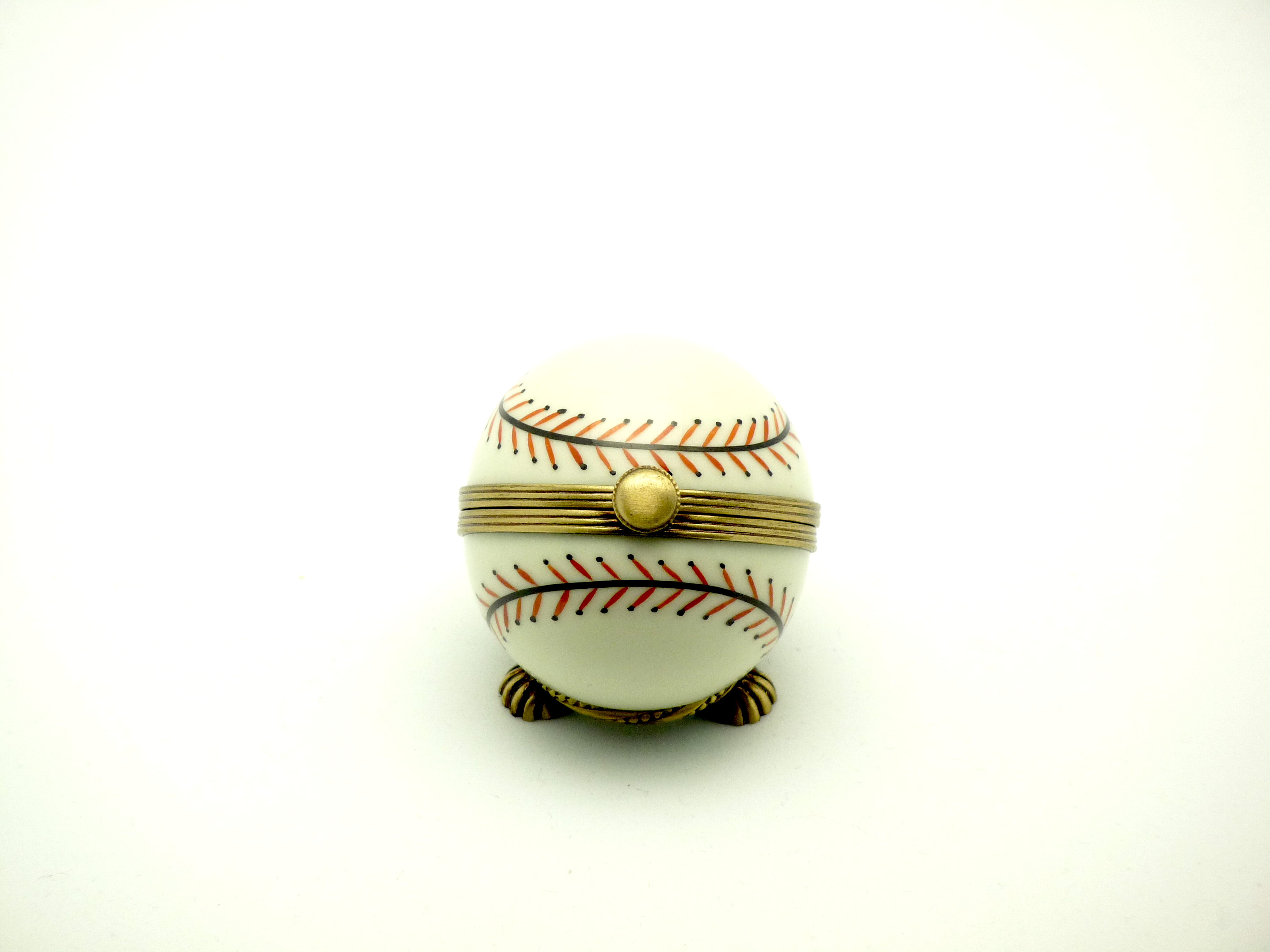 Baseball on metal stand