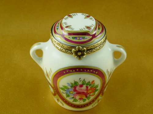 Urn with burgundy and flowers