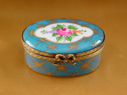 Oval blue with gold and flowers