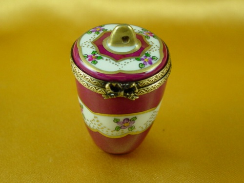 Burgundy urn with gold handle