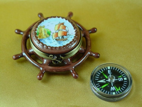 Ship's wheel with compass