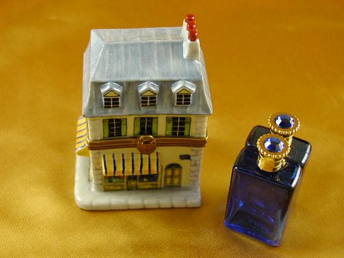 Perfume house with two bottles