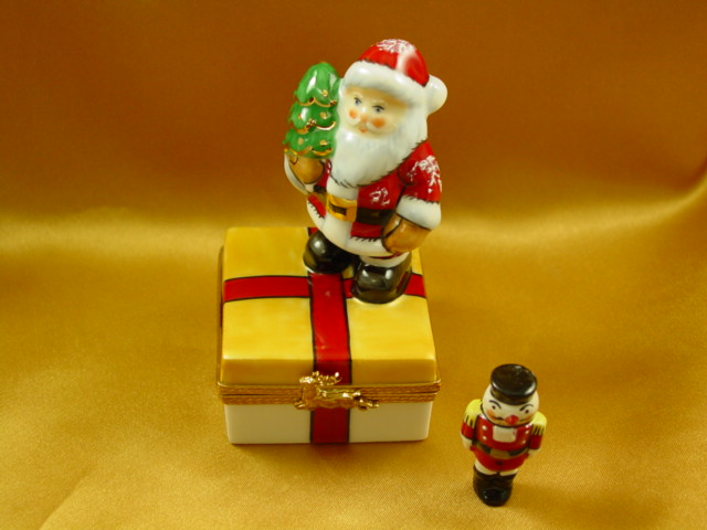Santa on present with removable nutcracker