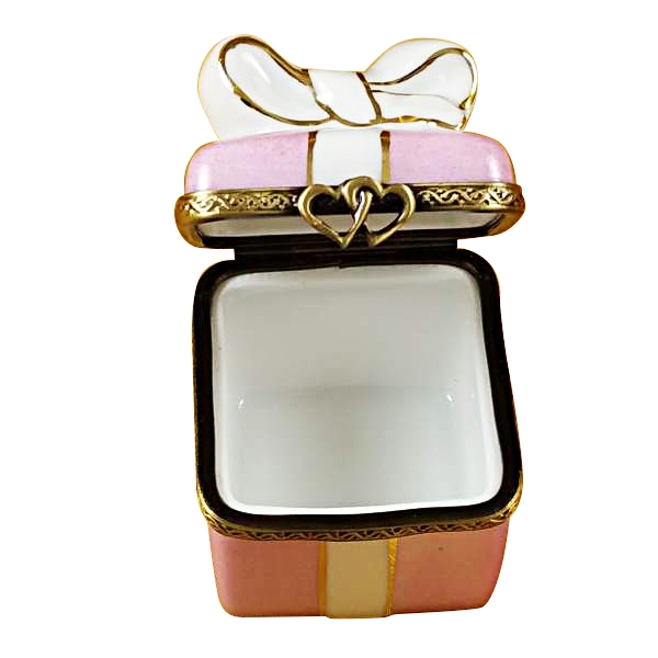 Pink gift wrapped box w/gold ribbon