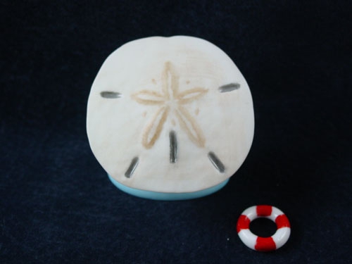 SAND DOLLAR WITH LIFE BUOY