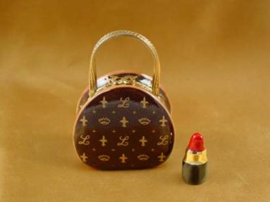 Designer purse with lipstick