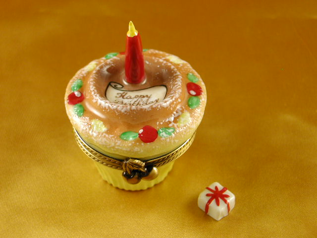 Birthday cupcake with red candle & cherries