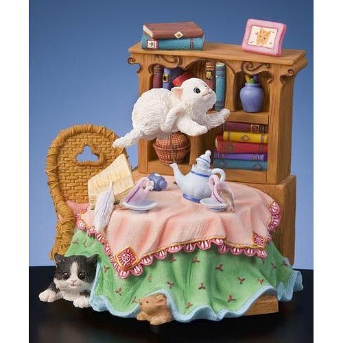 Cat Jumping Over Table Fig Music Box