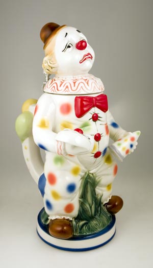 PORCELAIN SAD MULTICOLORED CLOWN STEIN